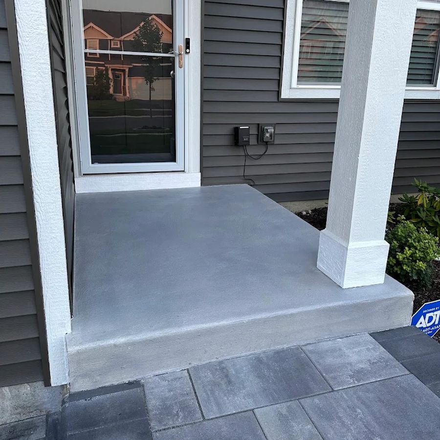 Gray coated concrete front porch by Naperville Painting & Epoxy Flooring